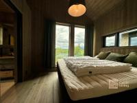 Postel nebo postele na pokoji v ubytování Brand new cabin on the sunny side of Gaustatoppen with a great view