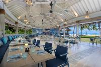 Um restaurante ou outro lugar para comer em Ifuru Island Maldives - Free Domestic Flights for 2 with Min 7 Night Stays - 20 Apr to 15 Oct 2026