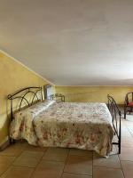 Posteľ alebo postele v izbe v ubytovaní La Perla di Assisi