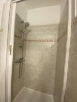 a shower with a glass door in a bathroom at Chris&#39;Home2 in Roquebrune-Cap-Martin