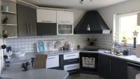 Kuchyňa alebo kuchynka v ubytovaní Apartman GRIZZLY