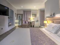 Fiscardonna Luxury Suitesにあるベッド
