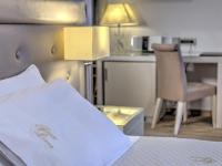 Fiscardonna Luxury Suitesにあるベッド