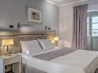 Fiscardonna Luxury Suitesにあるベッド