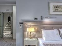 Fiscardonna Luxury Suitesにあるベッド