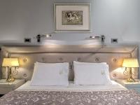 Fiscardonna Luxury Suitesにあるベッド