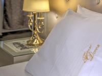 Fiscardonna Luxury Suitesにあるベッド
