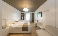 Posteľ alebo postele v izbe v ubytovaní Hotel Lener