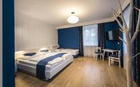 Posteľ alebo postele v izbe v ubytovaní Hotel Lener