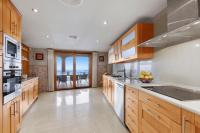 Kuchyň nebo kuchyňský kout v ubytování Villa Luna Suites