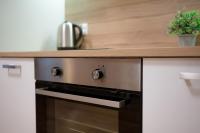 Kuchyňa alebo kuchynka v ubytovaní AtHome Toruń Apartamenty