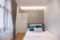 Posteľ alebo postele v izbe v ubytovaní AtHome Toruń Apartamenty