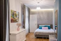 Posteľ alebo postele v izbe v ubytovaní AtHome Toruń Apartamenty