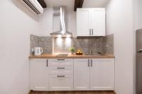 Kuchyňa alebo kuchynka v ubytovaní AtHome Toruń Apartamenty