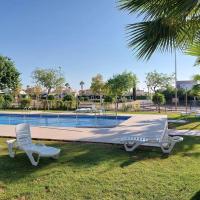 Bazén v ubytování Un Oasis en Hacienda del Álamo nebo v jeho okolí