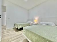 A bed or beds in a room at Juan XXIII