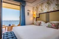 Posteľ alebo postele v izbe v ubytovaní Grand Hotel San Pietro Taormina