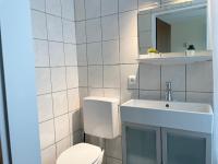 Koupelna v ubytování Ferienwohnung strandnah im Haus Frauenpreiss 56