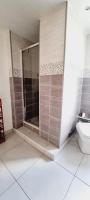 a bathroom with a shower and a toilet at La Villa Marine*Familiale et Conviviale in Coudekerque-Branche