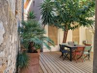 Patio alebo iná vonkajšia časť ubytovania Maison T4 centre ville et plage