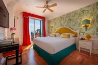 Posteľ alebo postele v izbe v ubytovaní Grand Hotel San Pietro Taormina