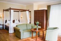 Łóżko lub łóżka w pokoju w obiekcie Seehotel Billroth