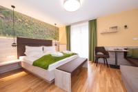 A bed or beds in a room at Der Almblick