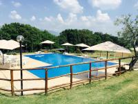 Bazén v ubytovaní Agriturismo Nociquerceto alebo v jeho blízkosti