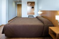 A bed or beds in a room at AS Monreal del Campo