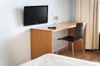 A television and/or entertainment centre at AS Monreal del Campo