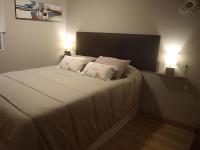 A bed or beds in a room at Segundo Caballerias, junto a la catedral, Aire Acondicionado, Wifi
