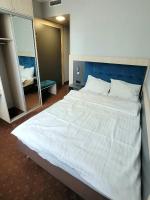 Posteľ alebo postele v izbe v ubytovaní euroHOTEL Sosnowiec Kazimierz