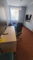 Televízia a/alebo spoločenská miestnosť v ubytovaní euroHOTEL Sosnowiec Kazimierz