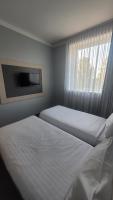 Posteľ alebo postele v izbe v ubytovaní euroHOTEL Sosnowiec Kazimierz