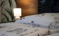 Posteľ alebo postele v izbe v ubytovaní Tisza Gyöngye Apartmanok