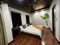Postel nebo postele na pokoji v ubytování Bangkok City Centre Luxurious Villa
