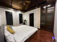 Postel nebo postele na pokoji v ubytování Bangkok City Centre Luxurious Villa