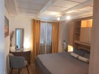 Postel nebo postele na pokoji v ubytování Apartment Natali