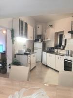 Kuchyň nebo kuchyňský kout v ubytování Apartment Natali