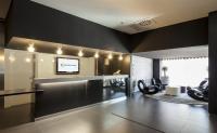 A television and/or entertainment centre at Ilunion Bel-Art