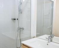 a bathroom with a shower and a sink at Twenty Business Flats Béziers in Béziers