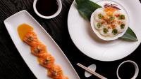 un plato de comida con camarones y un huevo retorcido en Nobu Hotel at Caesars Atlantic City, en Atlantic City