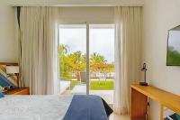 Postel nebo postele na pokoji v ubytování Cana Rock 108 Acceso Directo Piscina Punta Cana