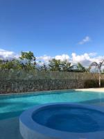 Bazén v ubytování Sol Caribe 101 Bayahibe con linda piscina! nebo v jeho okolí