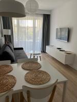 Telewizja i/lub zestaw kina domowego w obiekcie Apartament 34 Sun Towers