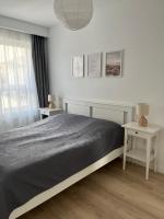 Łóżko lub łóżka w pokoju w obiekcie Apartament 34 Sun Towers