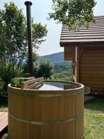 a hot tub in the backyard of a house at Le Cabanon in Saint-Jorioz