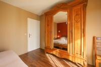 Łóżko lub łóżka w pokoju w obiekcie La Pause annécienne appartement familial