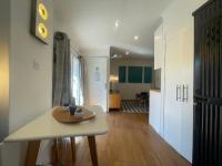 a living room with a table and a kitchen at Saint Joseph - Vieux Nice, AC, WiFi, 2 pers in Nice