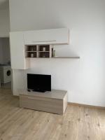 Televízia a/alebo spoločenská miestnosť v ubytovaní Casa delle Muse 48